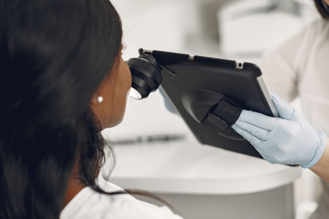 A physician assessing a patient at Skin&Co, Mississauga
