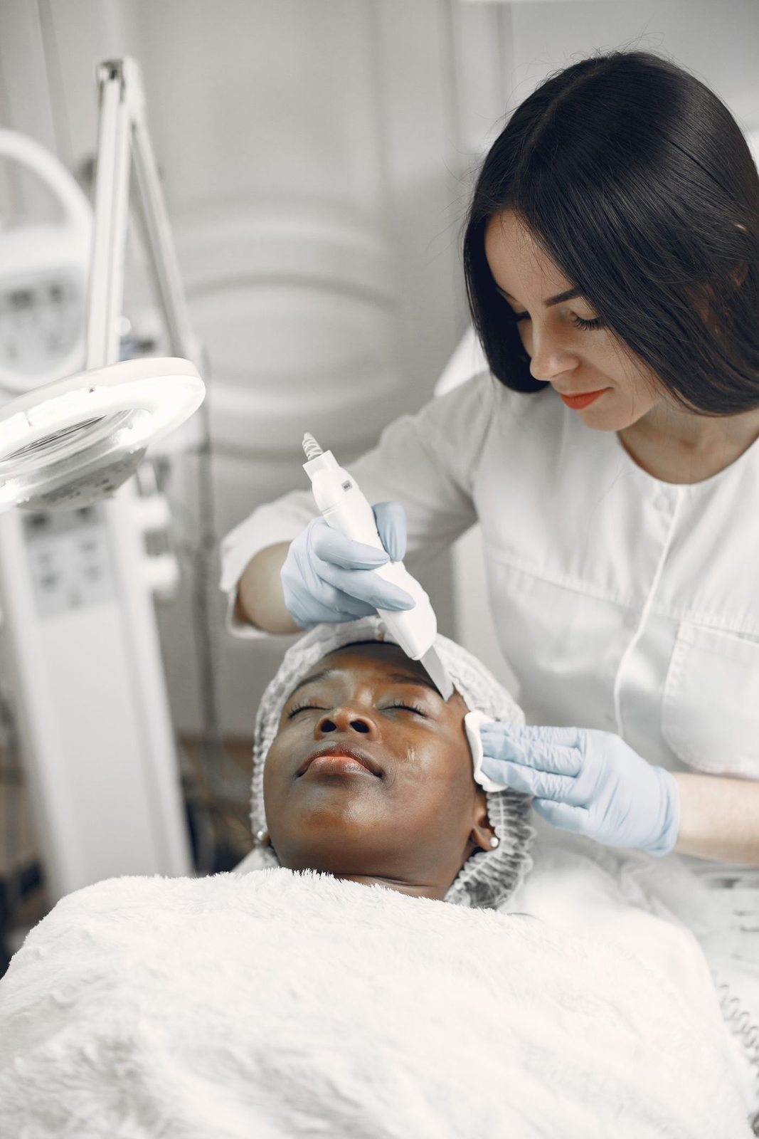 A physician assessing a patient at Skin&Co, Mississauga