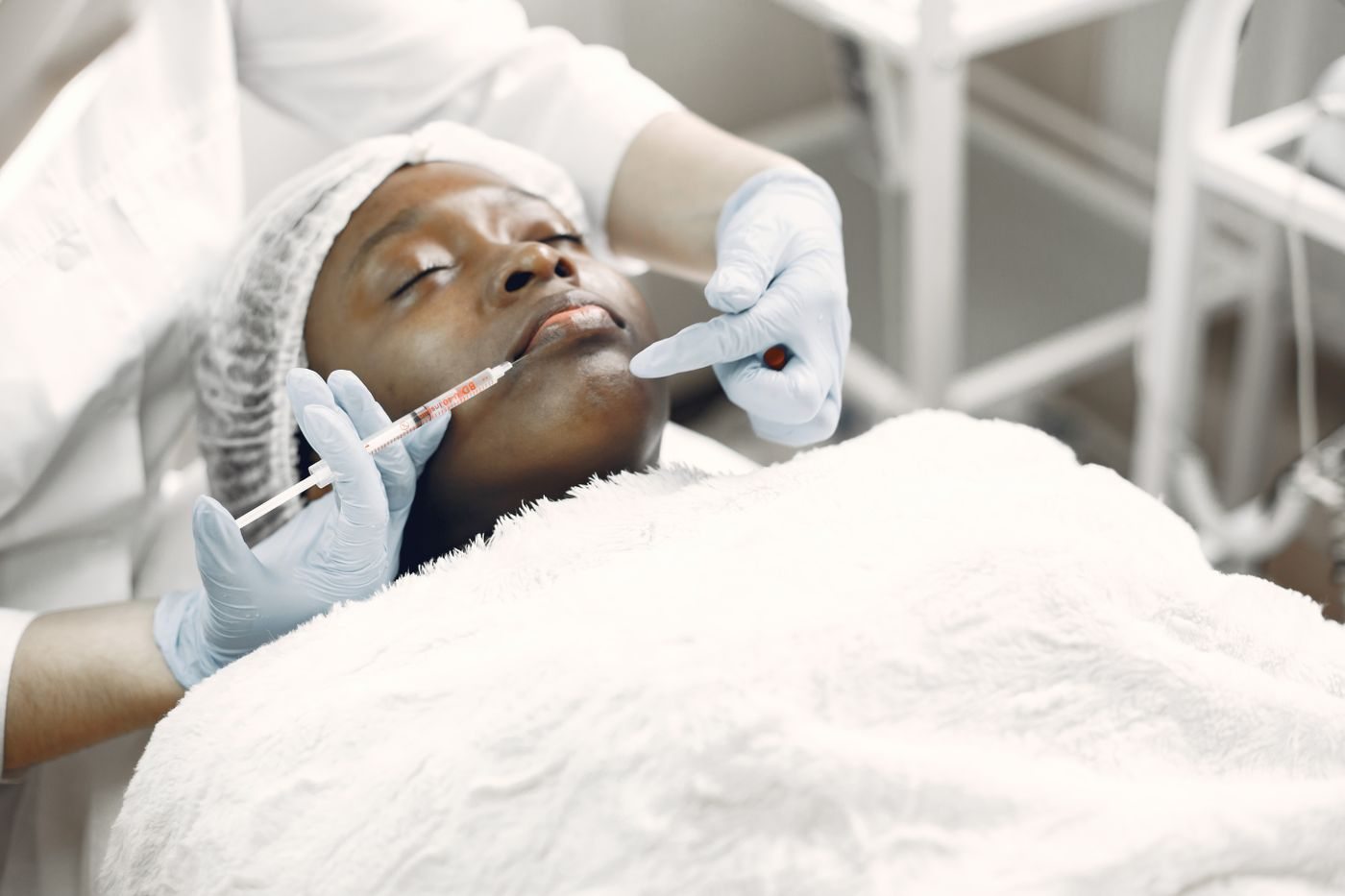 A physician assessing a patient at Skin&Co, Mississauga