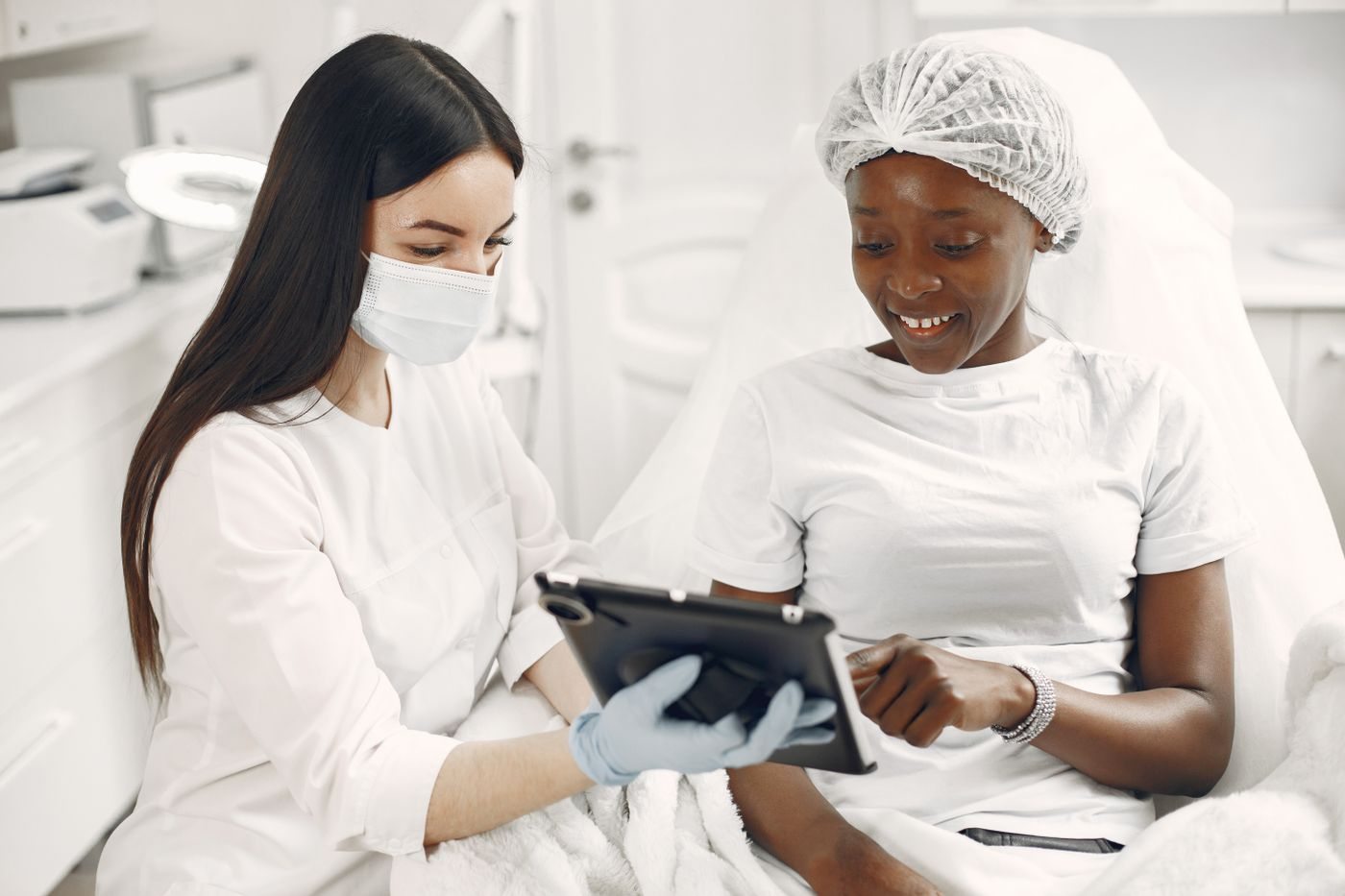 A physician assessing a patient at Skin&Co, Mississauga